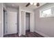 Bedroom with double door closet and wood-look flooring at 508 East End Ave, Durham, NC 27703