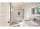 Updated bathroom with a shower and granite vanity at 508 East End Ave, Durham, NC 27703