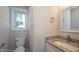 Clean bathroom with granite countertop and shower at 508 East End Ave, Durham, NC 27703