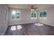 Living room with hardwood floors, neutral walls, and multiple windows at 508 East End Ave, Durham, NC 27703