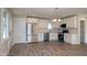 Modern kitchen with white cabinets, stainless steel appliances and granite counters at 508 East End Ave, Durham, NC 27703