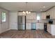 Modern kitchen with stainless steel appliances and white cabinetry at 508 East End Ave, Durham, NC 27703