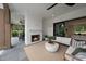 Outdoor patio with fireplace, seating area, and ceiling fan at 3300 Founding Place, Raleigh, NC 27612