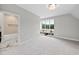 Clean bathroom with a shower and bathtub, and marble flooring at 3300 Founding Place, Raleigh, NC 27612