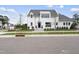 Two-story white house with gray roof, landscaping, and walkway at 3300 Founding Place, Raleigh, NC 27612