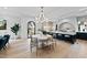 Bright dining area with a round table and modern chandelier at 3300 Founding Place, Raleigh, NC 27612