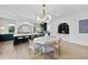 Bright dining area with a round table and modern chandelier at 3300 Founding Place, Raleigh, NC 27612
