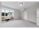 Bright bedroom with built-in window seat and access to a walk-in closet at 3300 Founding Place, Raleigh, NC 27612