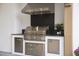 Stainless steel outdoor kitchen with built-in grill at 3300 Founding Place, Raleigh, NC 27612