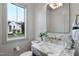 Modern powder room with marble vanity and gold fixtures at 3300 Founding Place, Raleigh, NC 27612