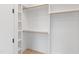 Walk-in closet with shelves and hanging space at 2119 Brewer St, Raleigh, NC 27608