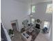 High ceiling living room with fireplace, hardwood floors, and open floor plan at 111 Newport Landing # 93, Garner, NC 27529