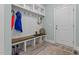 Convenient entryway with bench, cubbies, and coat hooks at 427 Cliffdale Rd, Chapel Hill, NC 27516