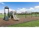 playground with slide and monkey bars at 472 Barbour Farm Ln, Four Oaks, NC 27524