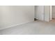 Empty bedroom showcasing neutral walls and carpeted floors at 226 Moore Creek Dr, Fuquay Varina, NC 27526
