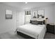 Bedroom with gray walls, and black and white decor at 1581 Ivy Meadow Ln, Zebulon, NC 27597