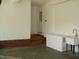 Garage with sink, freezer, and exterior access at 334 Ira B Tart Rd, Dunn, NC 28334