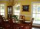 Bright dining room with hardwood floors and large windows at 334 Ira B Tart Rd, Dunn, NC 28334
