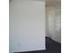 Bright hallway with carpet and doors at 334 Ira B Tart Rd, Dunn, NC 28334