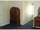 Bedroom with antique dresser and hallway access at 334 Ira B Tart Rd, Dunn, NC 28334