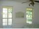Bedroom with two windows and ceiling fan at 334 Ira B Tart Rd, Dunn, NC 28334