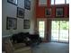 Spacious living room with high ceilings, large windows and a cozy sitting area at 334 Ira B Tart Rd, Dunn, NC 28334