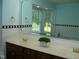 Bathroom with double vanity and large mirror at 334 Ira B Tart Rd, Dunn, NC 28334