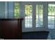 Bedroom with french doors leading to backyard patio at 334 Ira B Tart Rd, Dunn, NC 28334