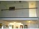 White railing balcony overlooking the entryway at 334 Ira B Tart Rd, Dunn, NC 28334