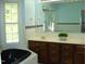Bathroom with corner bathtub and double vanity at 334 Ira B Tart Rd, Dunn, NC 28334