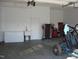 Spacious garage with utility sink, freezer, and ample storage at 334 Ira B Tart Rd, Dunn, NC 28334