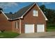 Brick two car garage with attached home at 334 Ira B Tart Rd, Dunn, NC 28334