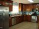 Kitchen with stainless steel appliances and wood cabinets at 334 Ira B Tart Rd, Dunn, NC 28334