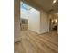 Light and spacious entryway with hardwood floors and a view of the staircase at 6030 Preacher Hayes Rd, Mebane, NC 27302