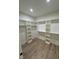 Spacious walk-in closet with ample shelving at 6030 Preacher Hayes Rd, Mebane, NC 27302