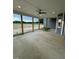 Covered porch with concrete flooring and ceiling fan at 6030 Preacher Hayes Rd, Mebane, NC 27302