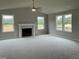 Large living room with fireplace and high ceilings at 83 Oakfield Trace Dr, Four Oaks, NC 27524