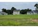 Spacious backyard with a view of neighboring homes at 83 Oakfield Trace Dr, Four Oaks, NC 27524