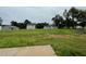 Community overview showcasing a grassy lot and neighboring homes at 83 Oakfield Trace Dr, Four Oaks, NC 27524