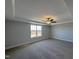 Spacious bedroom with ceiling fan and window at 97 Mapledale Ct, Benson, NC 27504