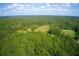 Aerial view of a large wooded area with a clearing at 878 Green Hill Rd, Franklinton, NC 27525