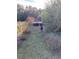 Backyard with a dog behind a chain link fence at 878 Green Hill Rd, Franklinton, NC 27525