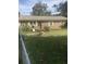 Brick ranch house with a green door and yard at 878 Green Hill Rd, Franklinton, NC 27525
