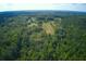 Aerial view of property with cleared area and various items at 878 Green Hill Rd, Franklinton, NC 27525