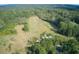 Aerial view of land with cleared area and debris at 878 Green Hill Rd, Franklinton, NC 27525