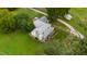 Aerial view of a farmhouse with a large yard at 8401 Mitchell Mill Rd, Zebulon, NC 27597