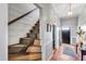 Unique spiral staircase with patterned carpet runner at 8401 Mitchell Mill Rd, Zebulon, NC 27597