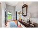 Bright entryway with hardwood floors and a console table at 8401 Mitchell Mill Rd, Zebulon, NC 27597