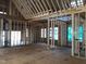 Interior framing of a new construction home, showing the layout of the main living areas at Lot 3 Roberson Creek Rd, Pittsboro, NC 27312