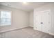 Charming bedroom with carpet and double door closet at 2332 Whitewing Ln # 2451, Wendell, NC 27591